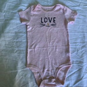 simple pink one piece "love" printed.